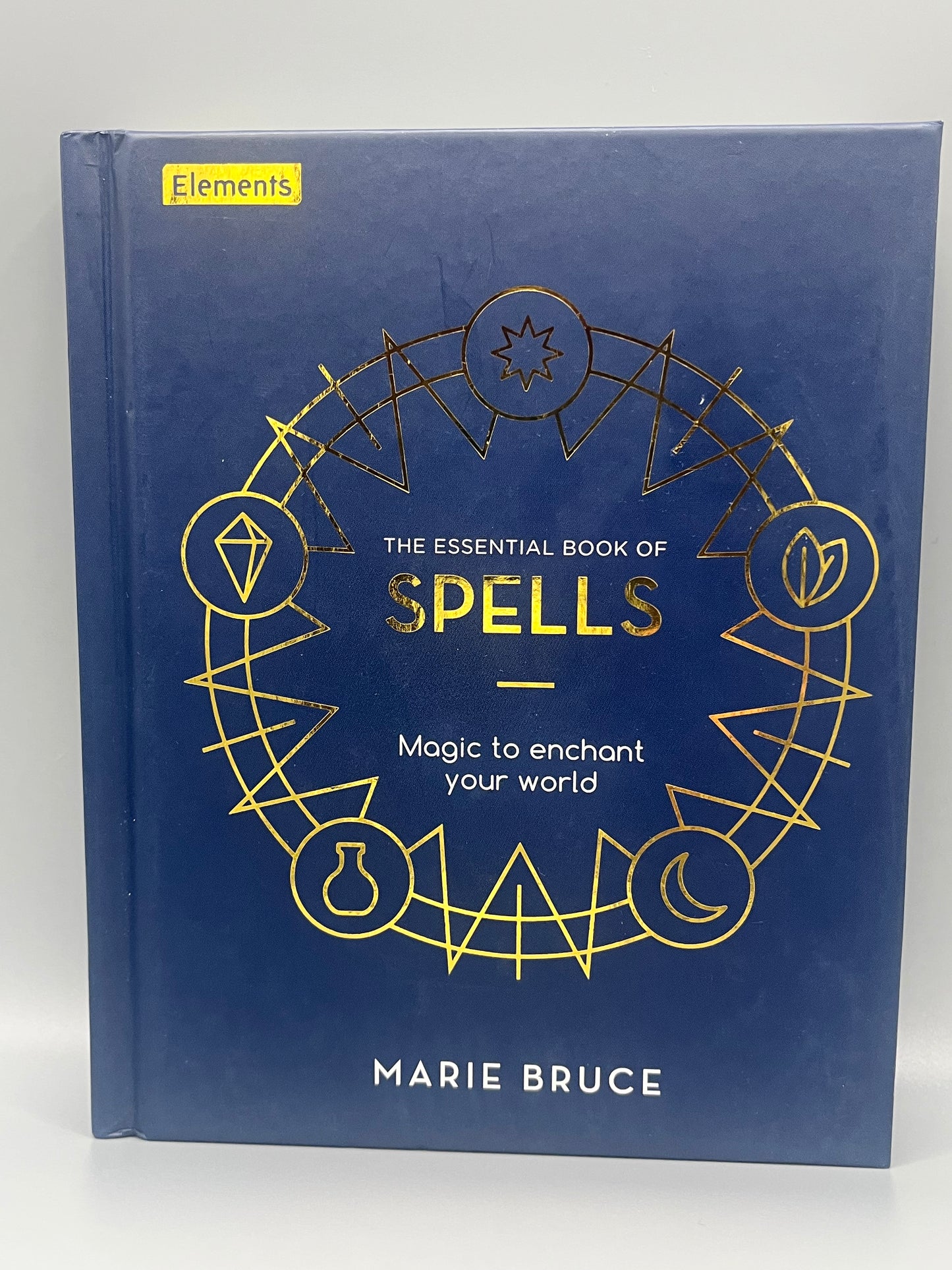 The Essential Book of Spells by Marie Bruce